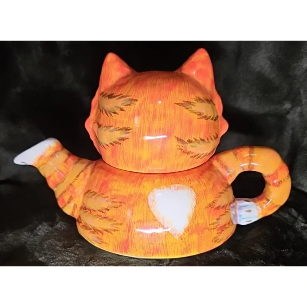 3 Piece‎ Teapot, Cat head as lid, Teapot, and Cup underneath. Unique